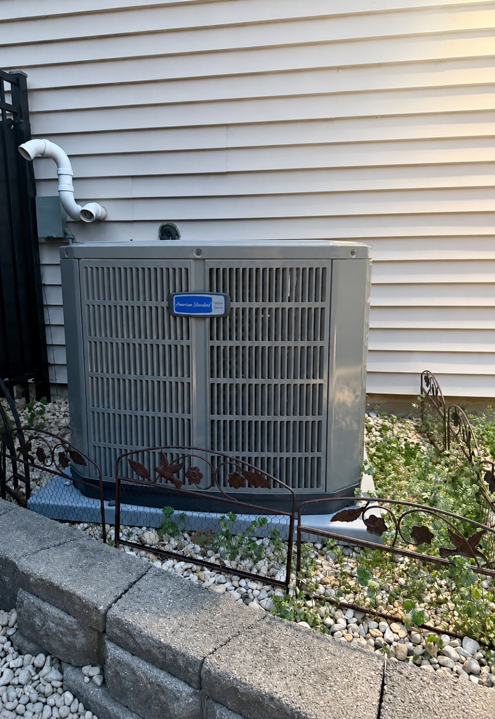 Outdoor air-conditioning system installed beside a home